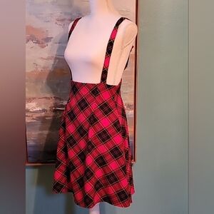 Plaid skirt with suspenders size medium in Excellent Condition.